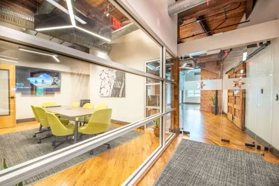 A hallway and conference room inside the Freedom First Credit Union building in Roanoke, Virginia.