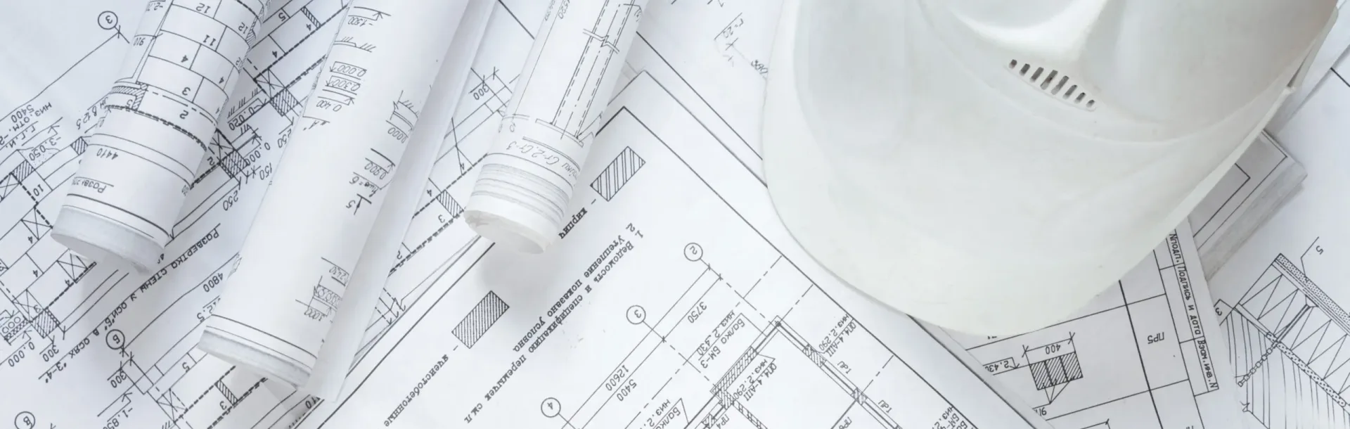 architect design working drawing sketch plans blueprints and making architectural construction model in architect studio,flat lay long banner