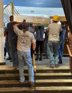 Hotel-Roanoke-Bringing-in-half-of-the-oval-bar-brass-flume2